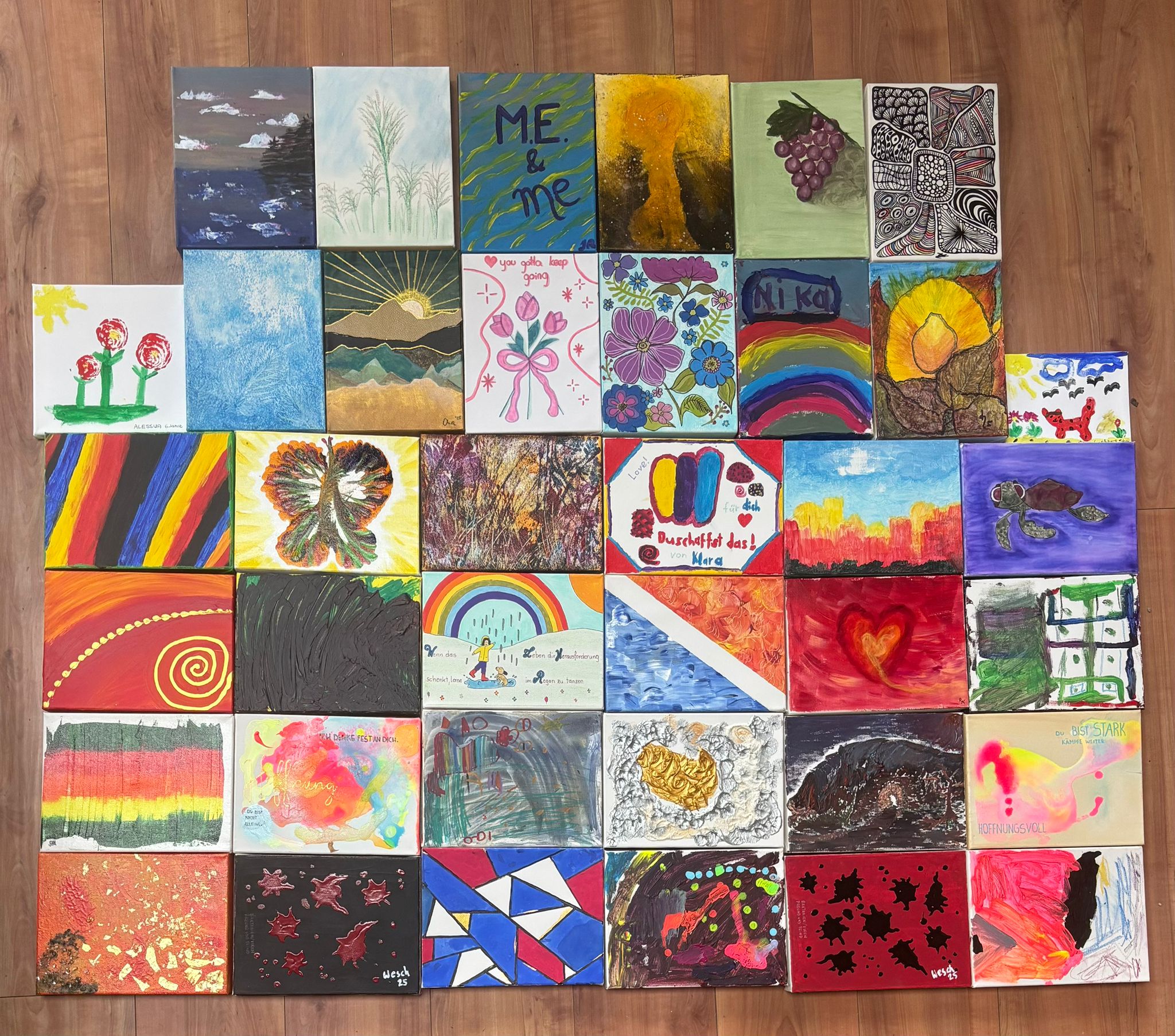 Zu sehen ist eine Collage aus selbstgemalten Bildern.